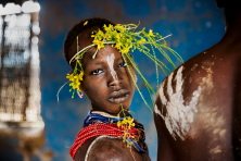 Child Adorned with Flowers. Omo Valley, Ethiopia, 2012.