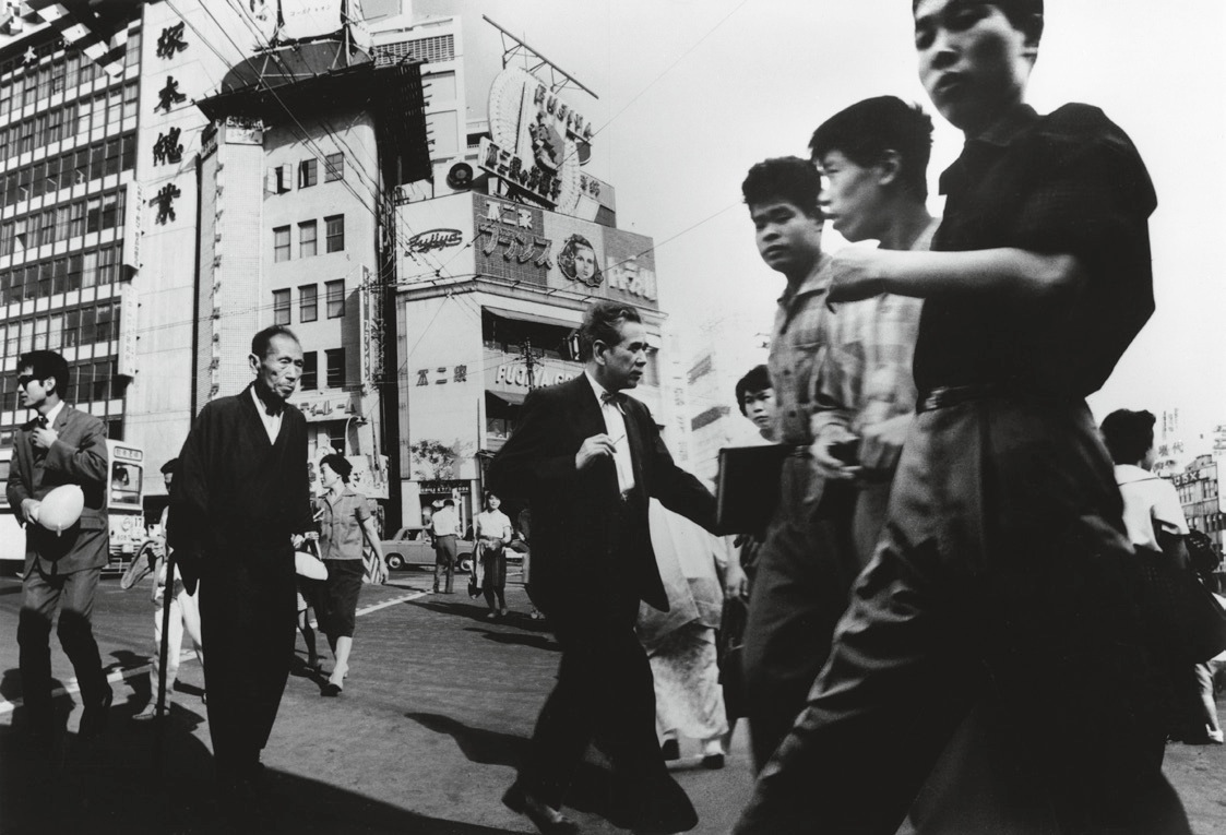 On the Ginza, three generations of Japanese males going in different directions, Tokyo, 1961